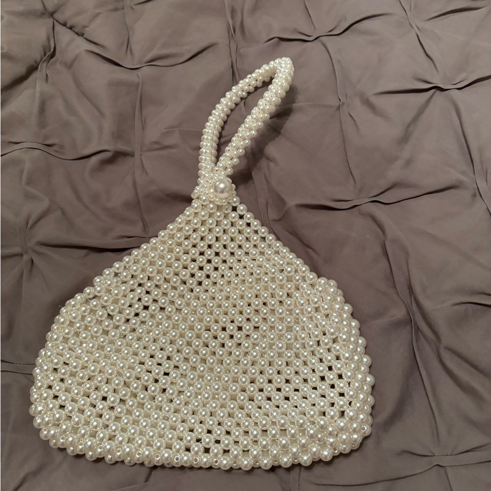 Small pearl clutch bag